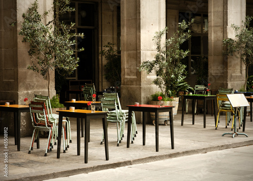 street cafe with colorful tables and chairs