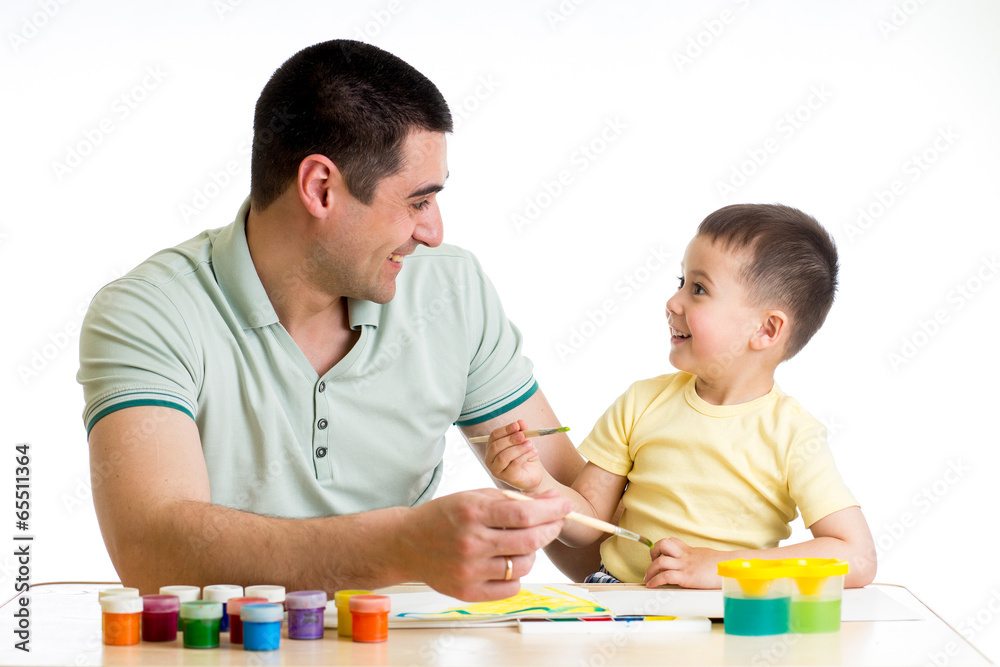 Fototapeta premium happy kid and dad paint together