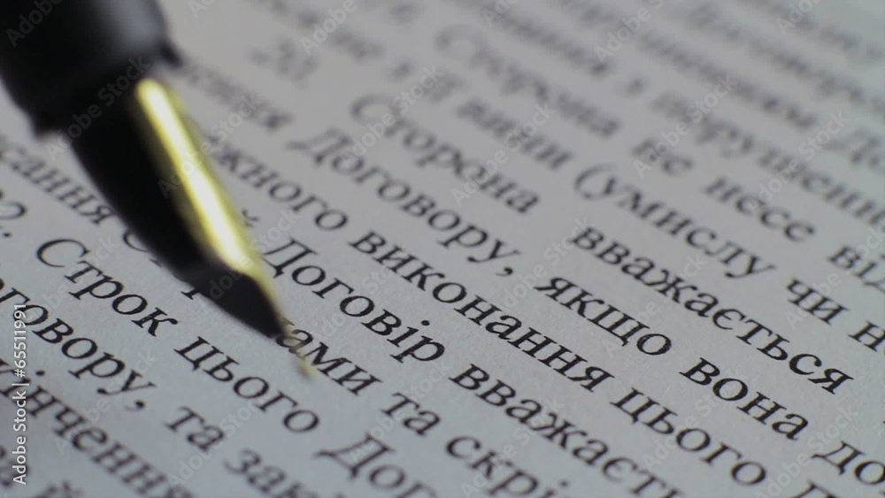 Close-up signing papers, contract, agreement, macro view Close-up signing papers, contract, agreement, macro view