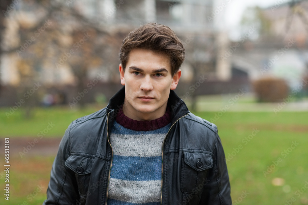 Man In Jacket Looking Away At Park Man In Jacket Looking Away At Park