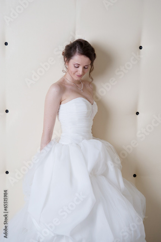 smiling bride in white dress