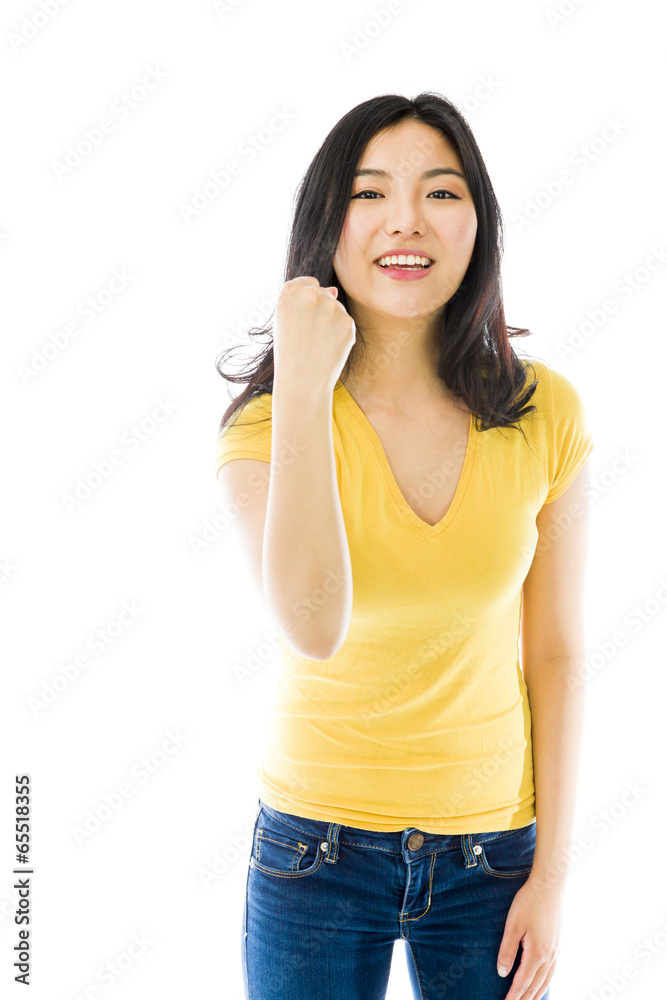 Young Asian woman celebrating success Young Asian woman celebrating success