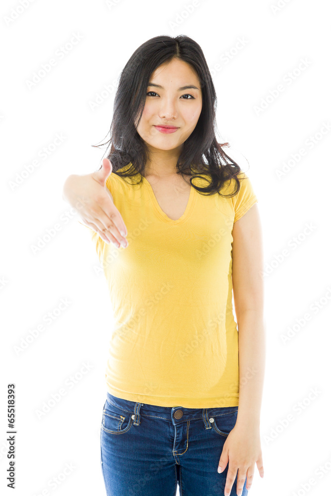 Fototapeta premium Young Asian woman offering hand for handshake