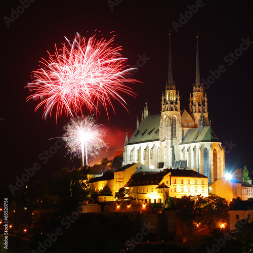 Gothic medieval cathedral with fireworks above