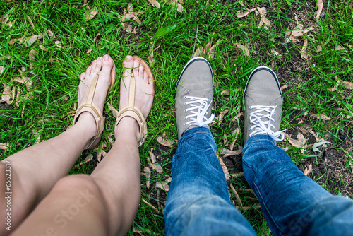 feet and shoes of couple of man and woman