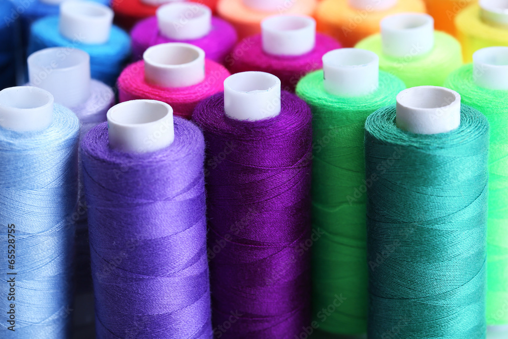 Multicolor sewing threads background Multicolor sewing threads background