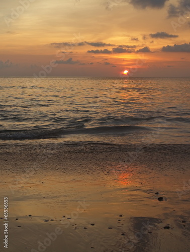 Expanse of the sea against the sunset sky