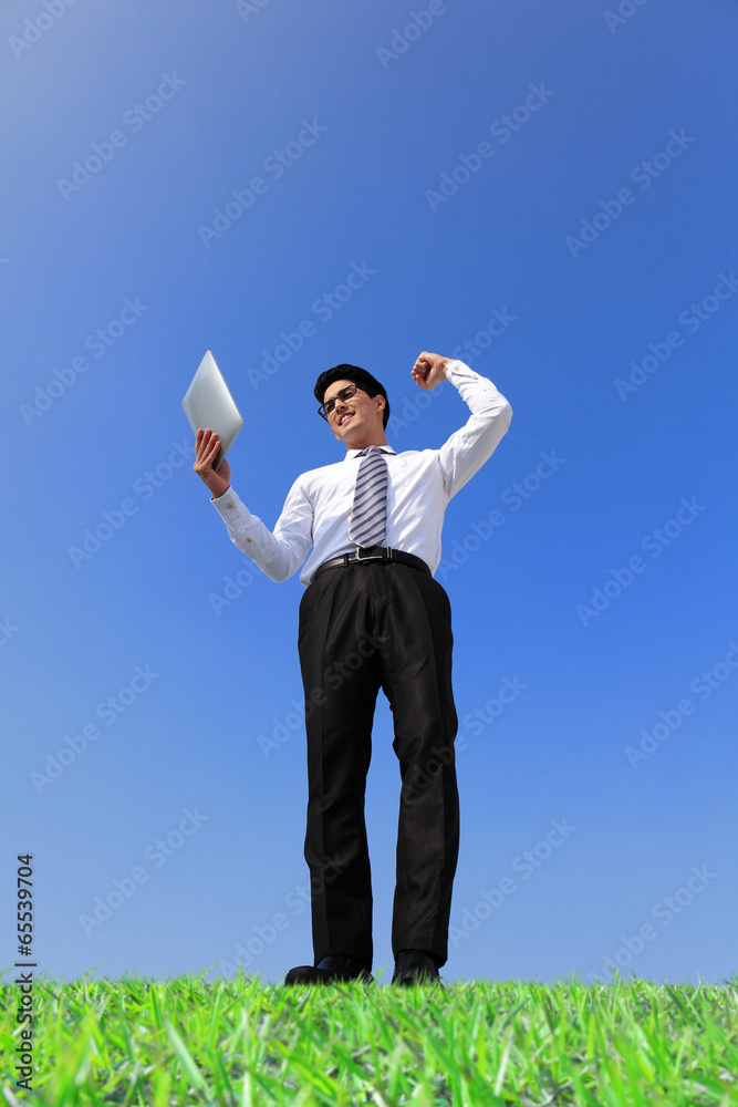 happy business man using touch pad happy business man using touch pad