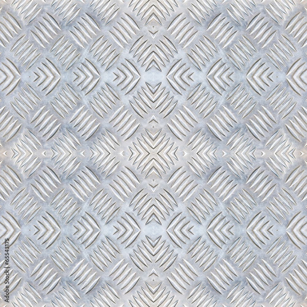 Background of metal diamond plate in silver color. Background of metal diamond plate in silver color.