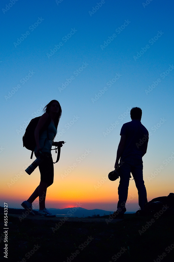 photographers outdoor at sunset