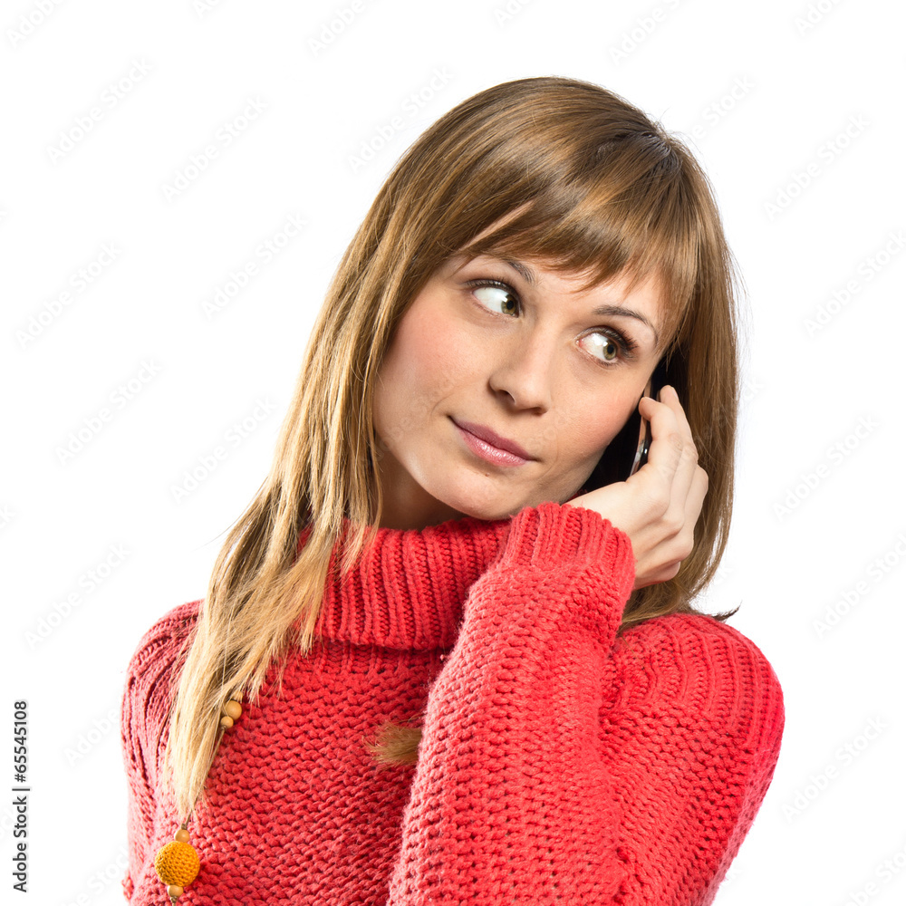 Young girl talking on mobile over white background Young girl talking on mobile over white background
