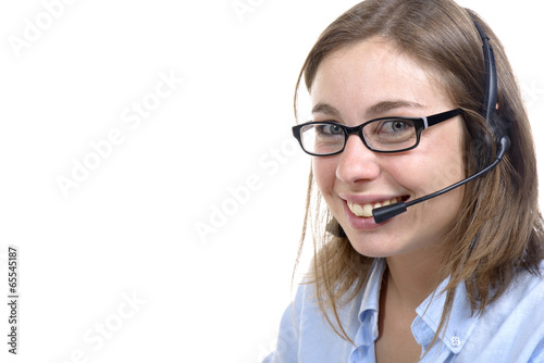 Photos a young switchboard operator smiling at the camera