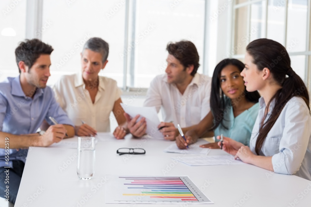 Attractive business people discussing at a meeting