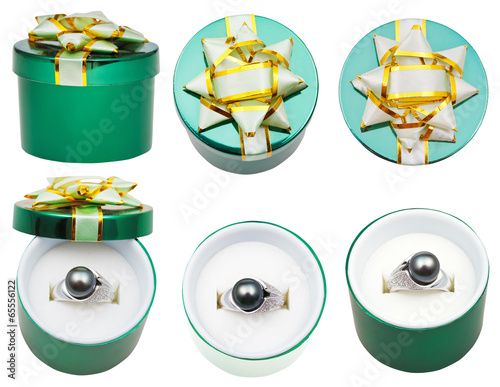 little round green box with black pearl ring