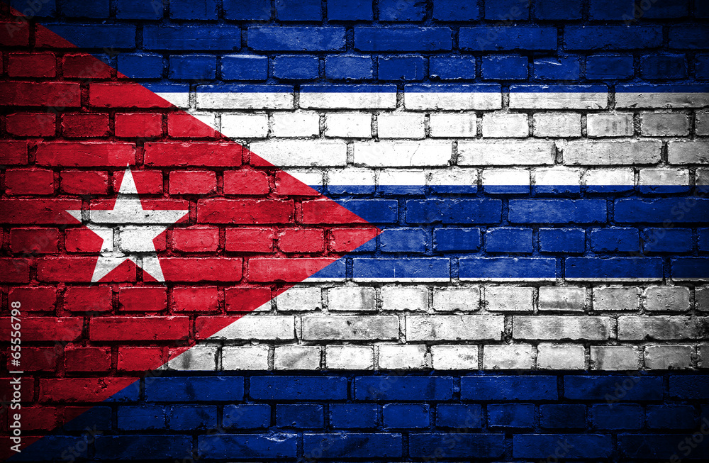 Brick wall with painted flag of Cuba