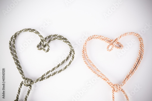 orange and green rope in heart shape with vignette