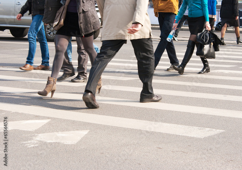 pedestrians cross the street © Radnatt
