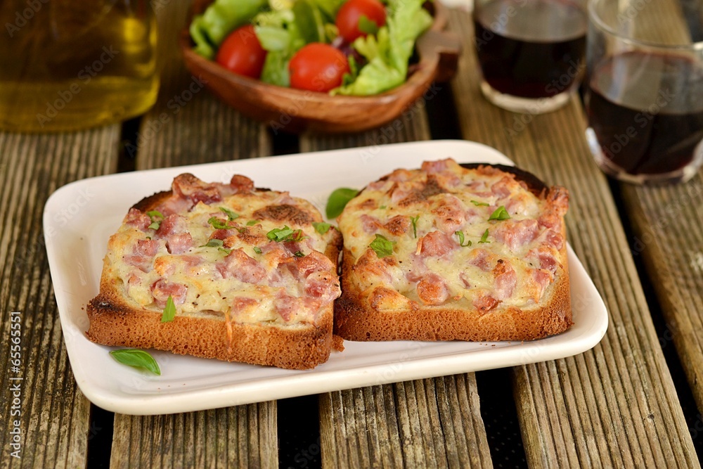 Warm open faced sandwiches with ham, cheese