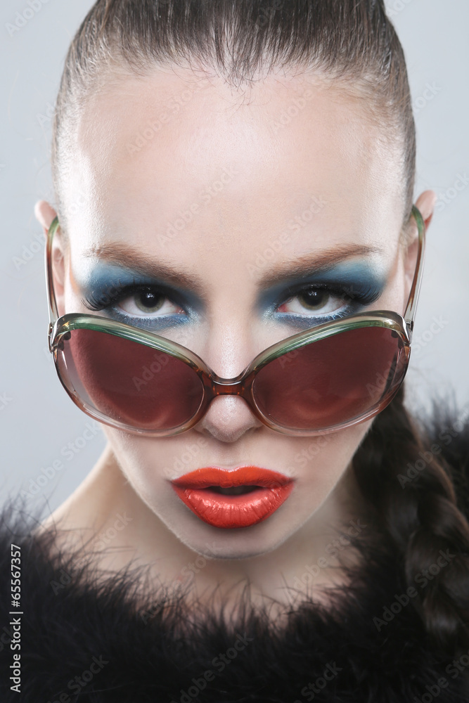 Stylish Woman With Beauty Makeup and Sunglasses Stylish Woman With Beauty Makeup and Sunglasses