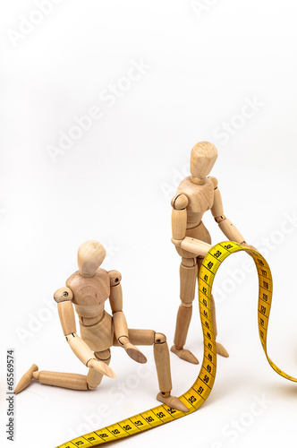 Zeichenpuppe mit Maßband