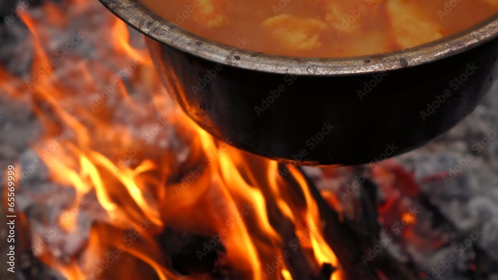 Close up of cooking Hungarian paprika potatoes on a campfire Close up of cooking Hungarian paprika potatoes on a campfire