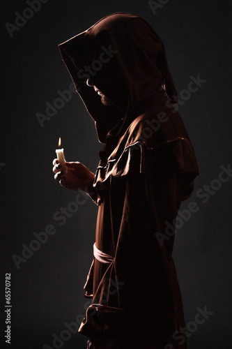 Fototapet mysterious Catholic monk