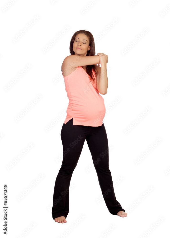 Fototapeta premium Beautiful pregnant woman doing stretching