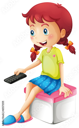 A girl holding a remote control