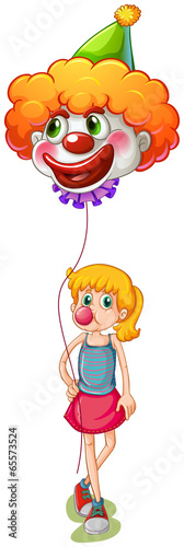 A tall girl holding a clown balloon