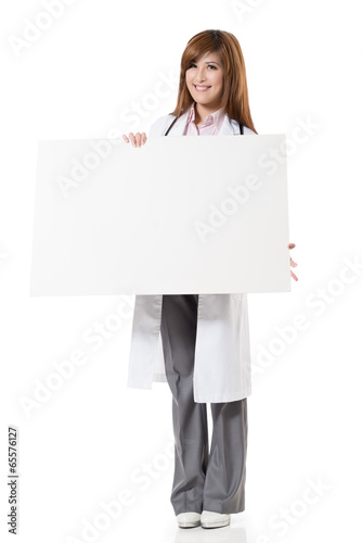 Asian doctor woman holding blank board