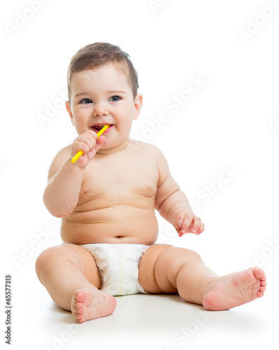 toddler boy brushing teeth
