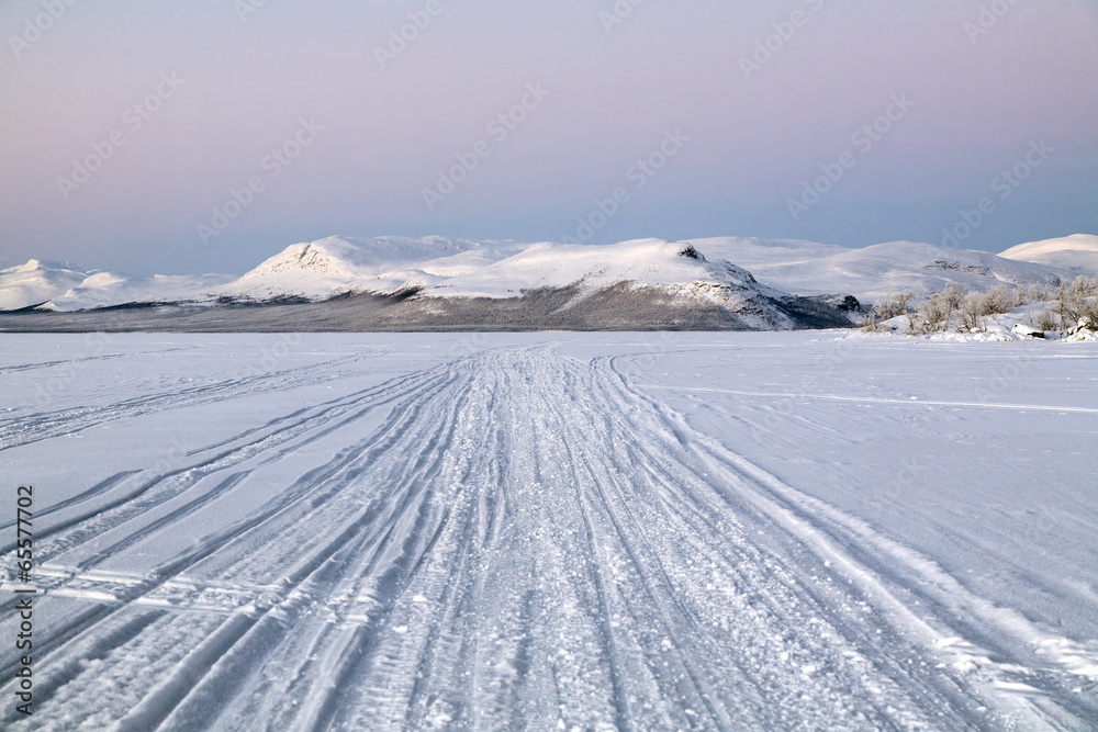 View of Pikku-Malla hill from Kilpisjarvi lake in winter, Finlan