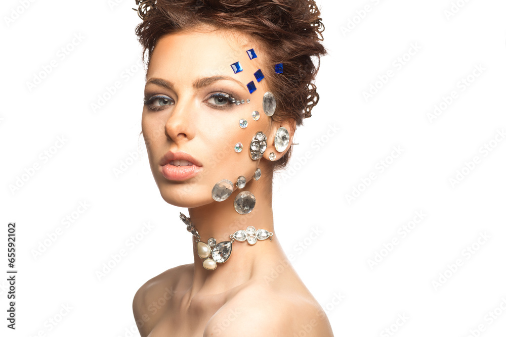 portrait of beautiful girl with diamonds on her face portrait of beautiful girl with diamonds on her face