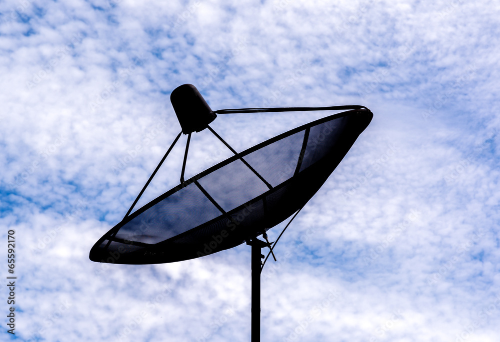 Satellites dish in the sky with clouds Satellites dish in the sky with clouds
