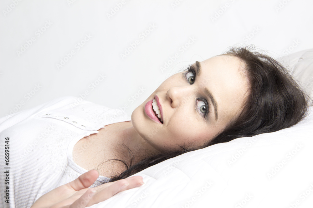 Obraz premium sexy beautiful woman lying on a her bed