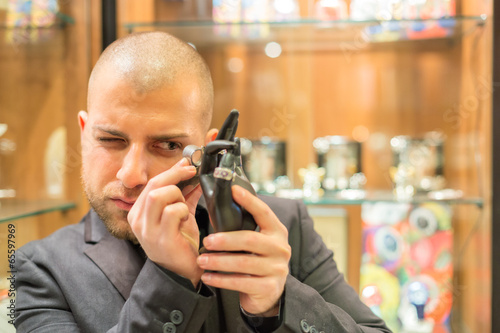 Gemologist inspecting Jewelry