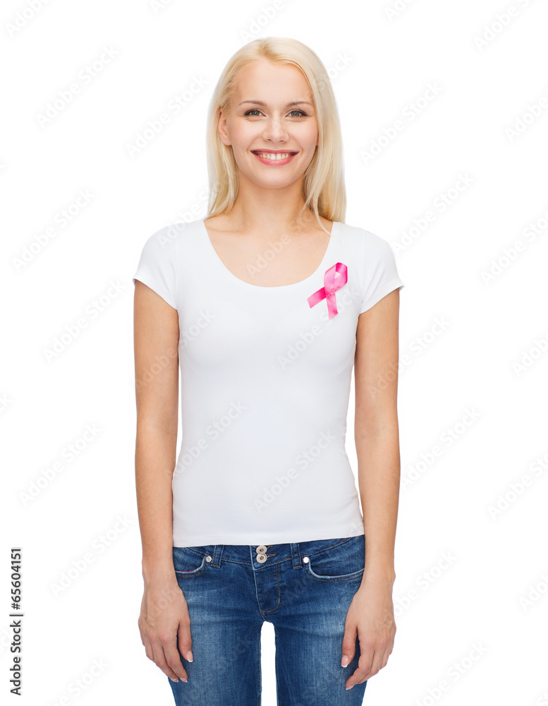 smiling woman with pink cancer awareness ribbon smiling woman with pink cancer awareness ribbon