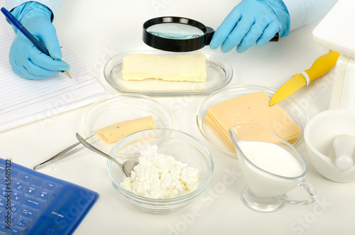 Inspecting butter in phytocontrol laboratory photo