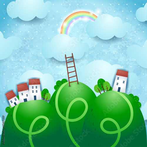 Fantasy landscape with village and rainbow