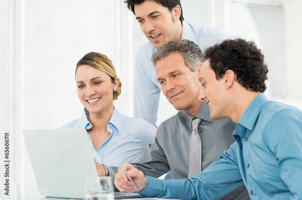 Fototapeta premium Businesspeople Working At Laptop