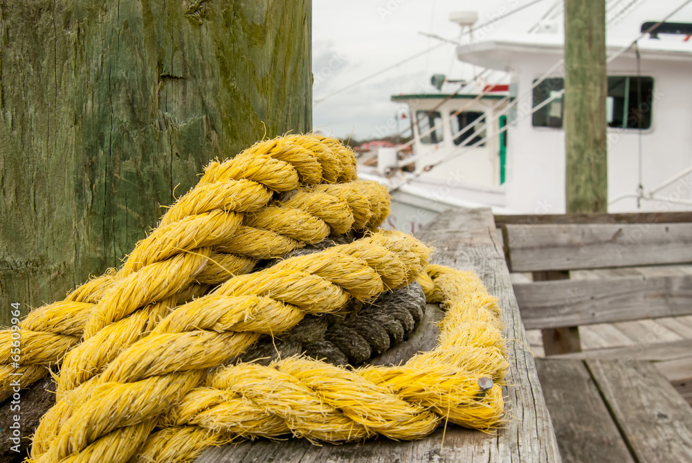 Thick Yellow Rope Wrapped Around Post on Pier