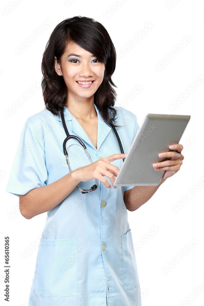 young nurse smiling while working young nurse smiling while working