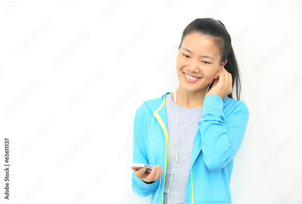 happy beautiful young asian woman enjoying the music happy beautiful young asian woman enjoying the music