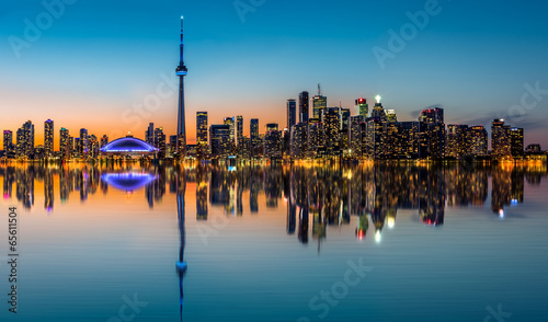 Toronto skyline at dusk reflected in the Inner Harbour Bay