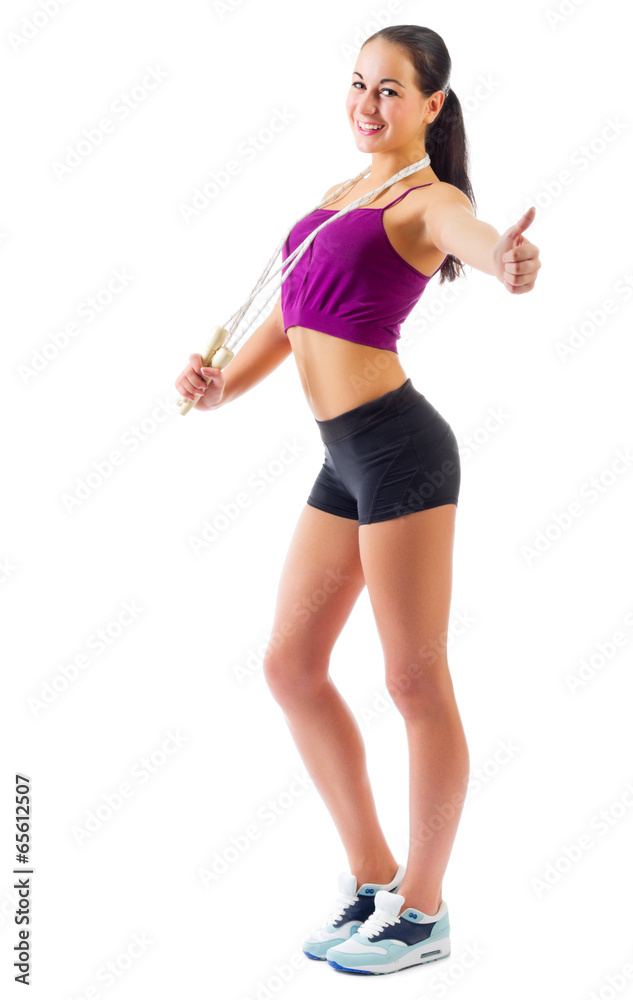 Sporty woman with skipping rope Sporty woman with skipping rope