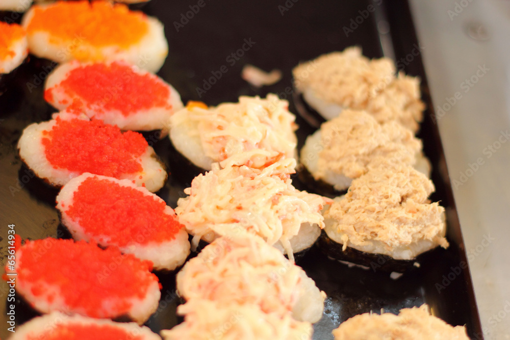 Japanese sushi - sushi egg, shrimp, crab stick, seaweed.