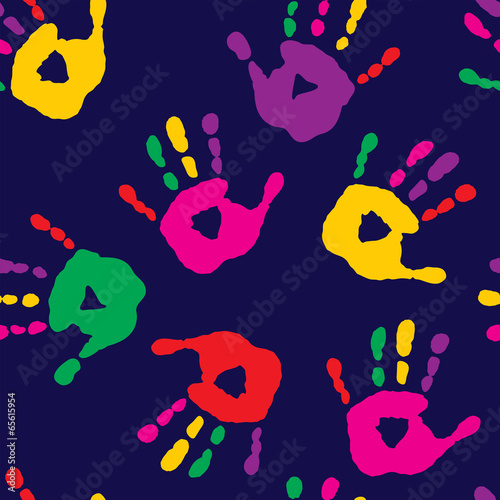 Seamless pattern with handprints on a blue background