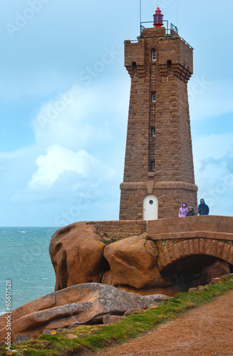Ploumanach lighthouse and family near. © wildman
