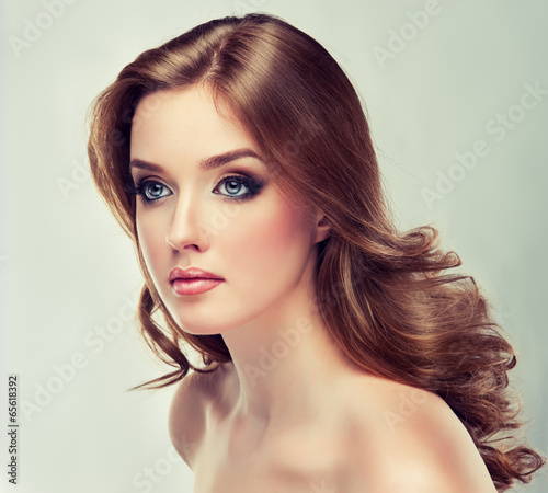 Fotografie Beautiful model  with curly hair