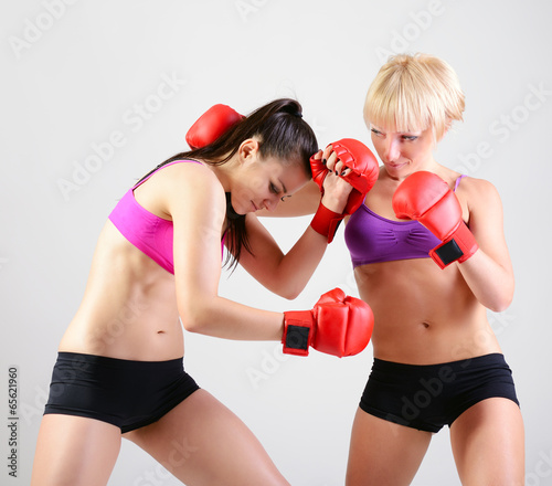 sport training of two boxing young woman © Khorzhevska
